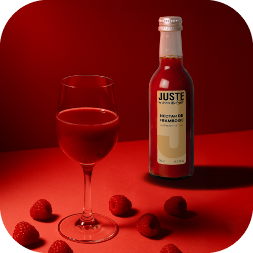 Bouteille en verre de nectar de framboise de couleur rouge rose fuchsia 25 cl de face verre fruit -  Juste le Choix du Fruit